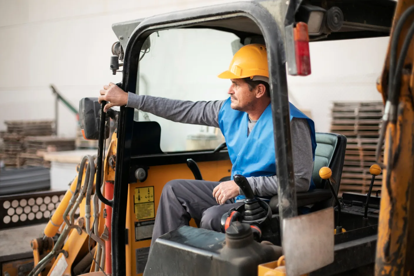 tower crane operator requirements: Skilled professional controlling a tower crane on a construction site in Canada, ensuring tower crane operator requirements: Skilled professional controlling a tower crane on a construction site in Canada, ensuring