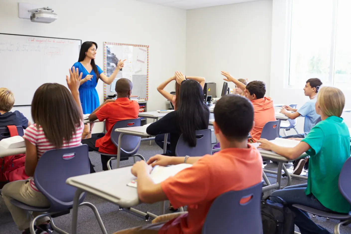 A student focused on preparing for the UKISET practice test using study materials.