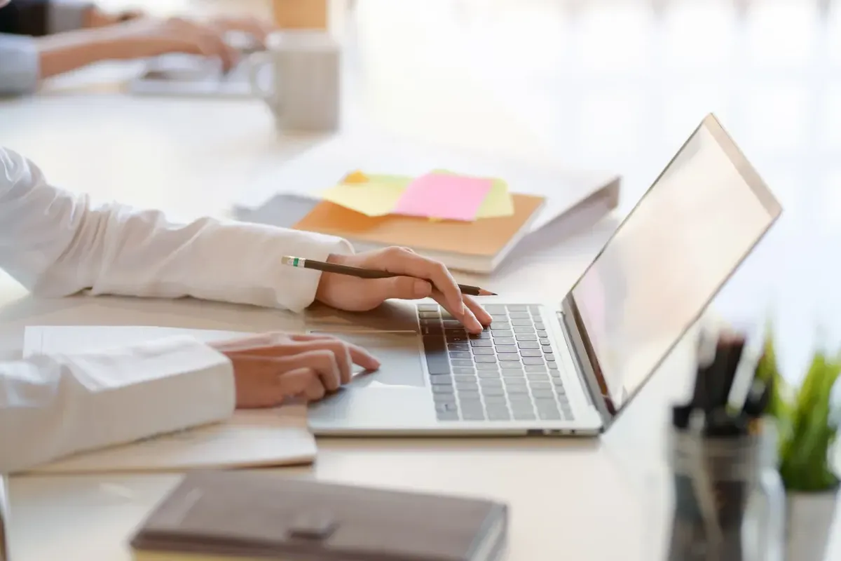 Washington Real Estate Practice Exam study session in the United States, showing managing broker candidates reviewing key law